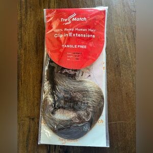 Light brown Remy hair extensions.